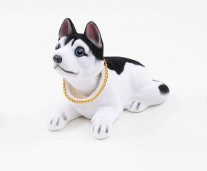 Chó lắc lư trên ô tô